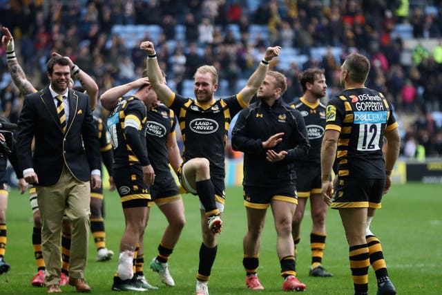 Dan Robson leads the Wasps post-match celebrations after their five-try win