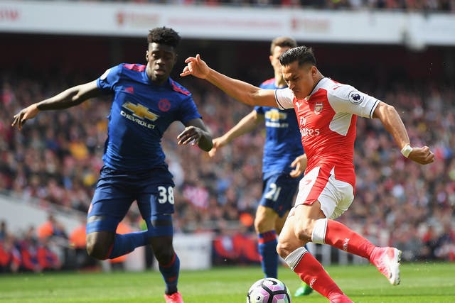 Arsenal's Alexis Sanchez gets an early shot in at the Emirates