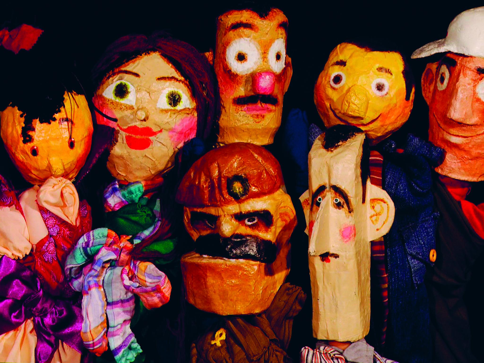 The assembled puppets of Top Goon and the chief villain 'Beeshu' with Assad's distinctive features