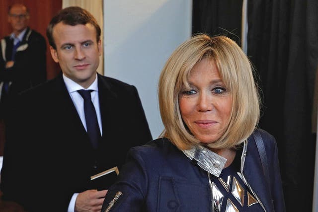 Emmanuel Macron and wife Brigitte Trogneux arrive in Washington