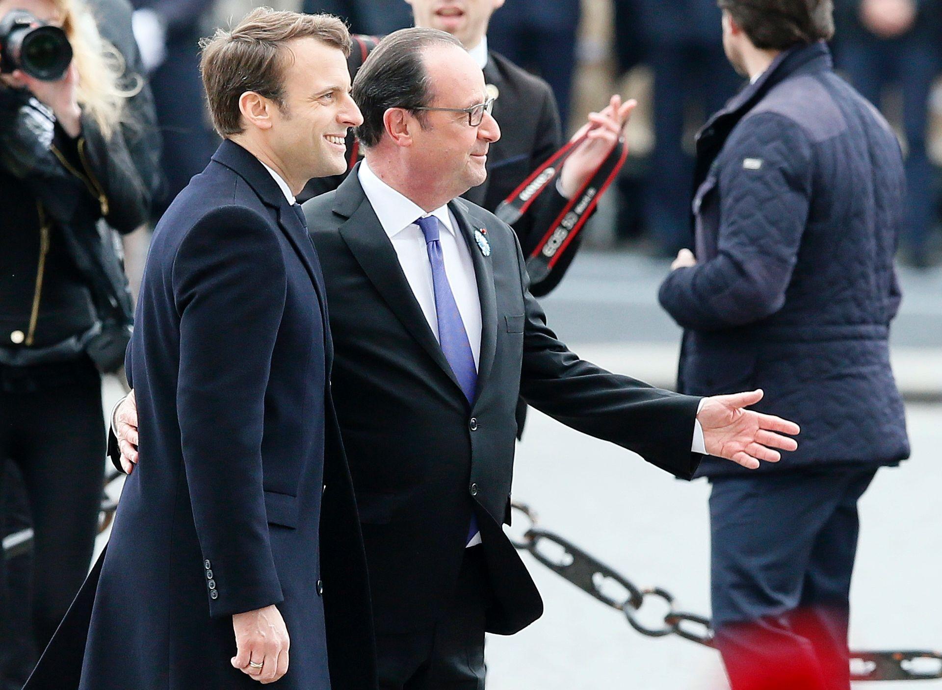 Outgoing French President François Hollande and President-elect Emmanuel Macron