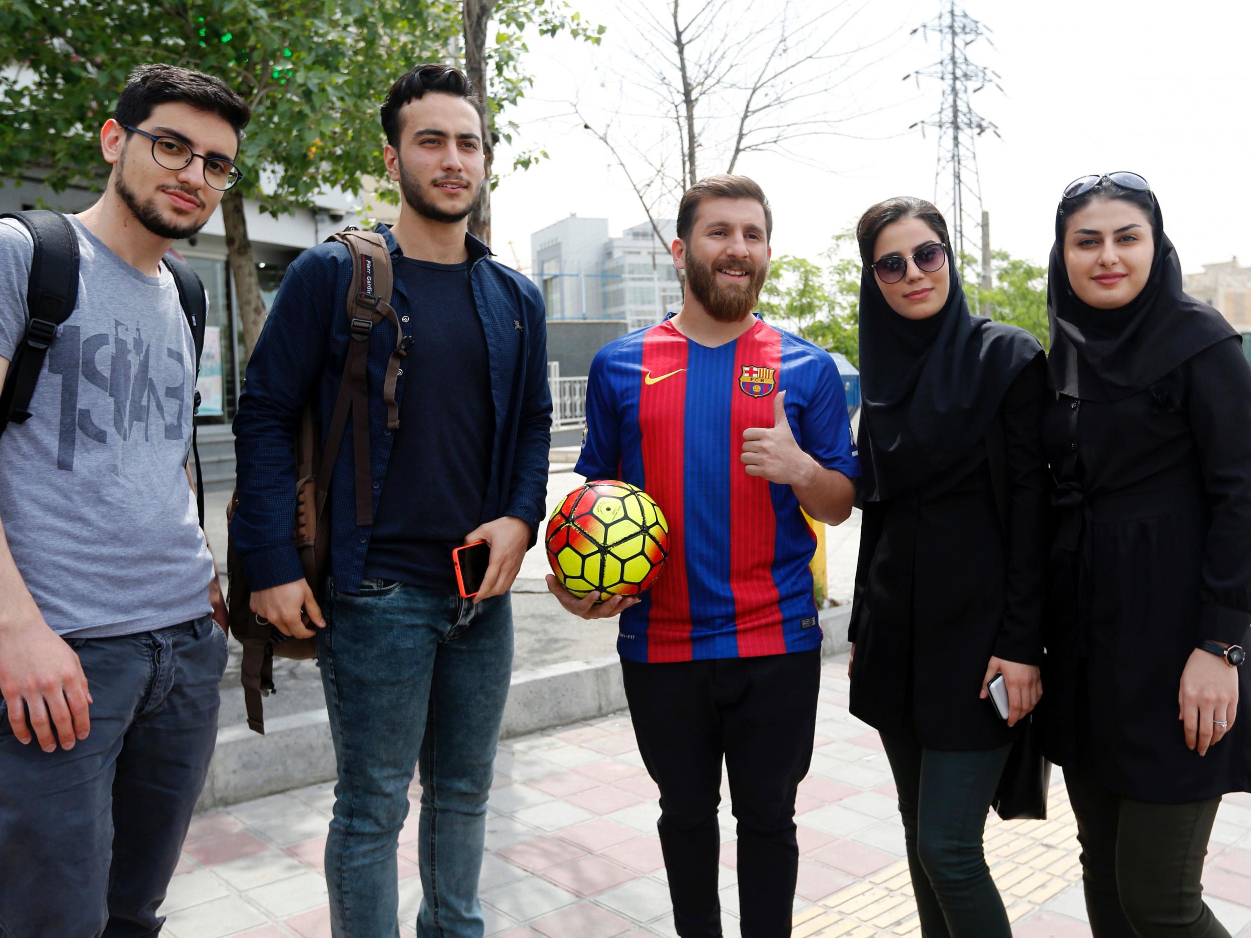 Parastesh pictured with some of his admirers