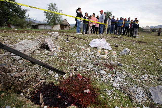 A blood stain is seen at the site of the explosion of a house where fireworks were stored in the town of San Isidro, Chilchotla