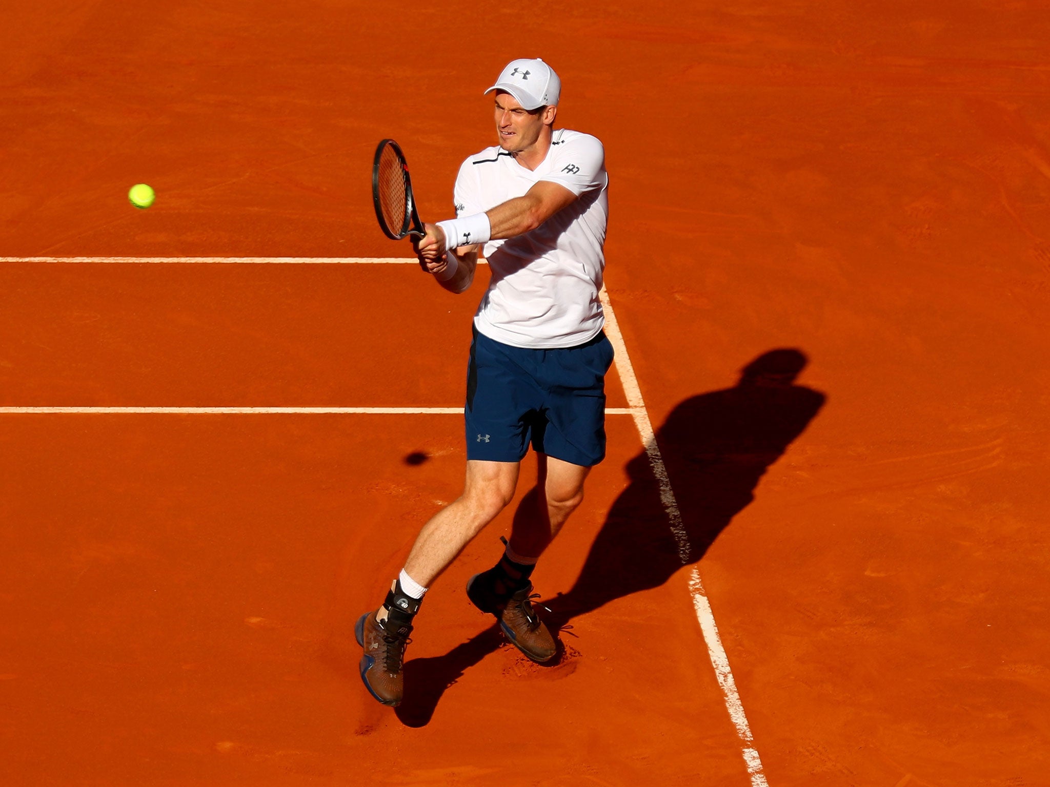 Andy Murray plays a back-handed shot in the second set