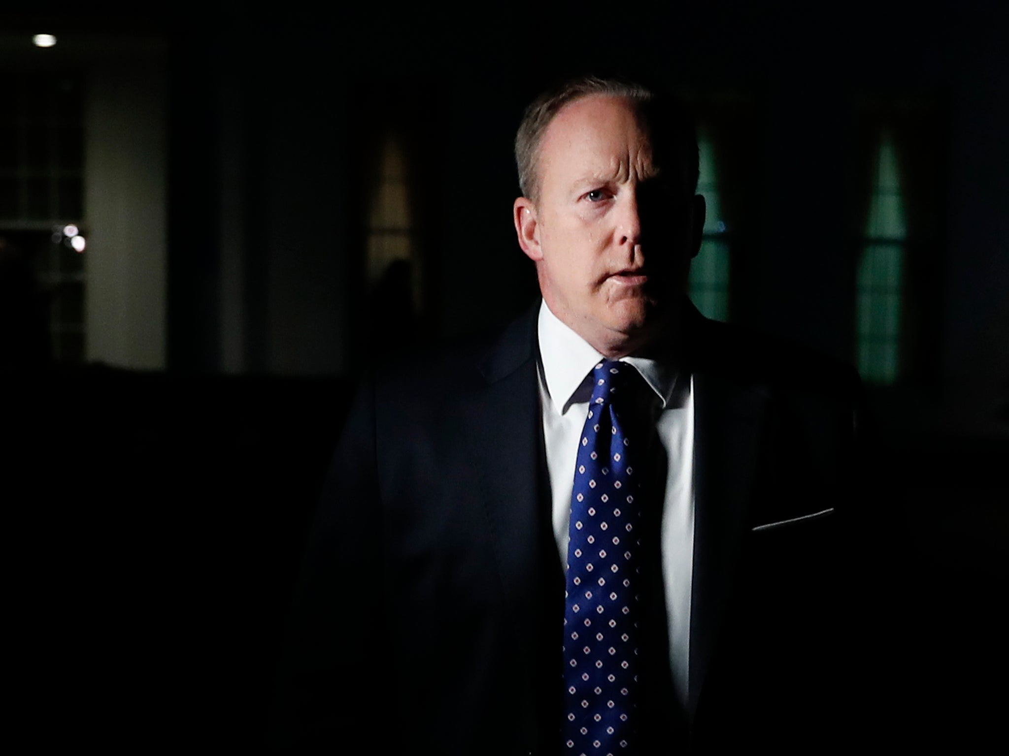 White House press secretary Sean Spicer walks from the West Wing to speak to reporters