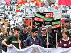 May under pressure to cut cost of university as public rejects fees