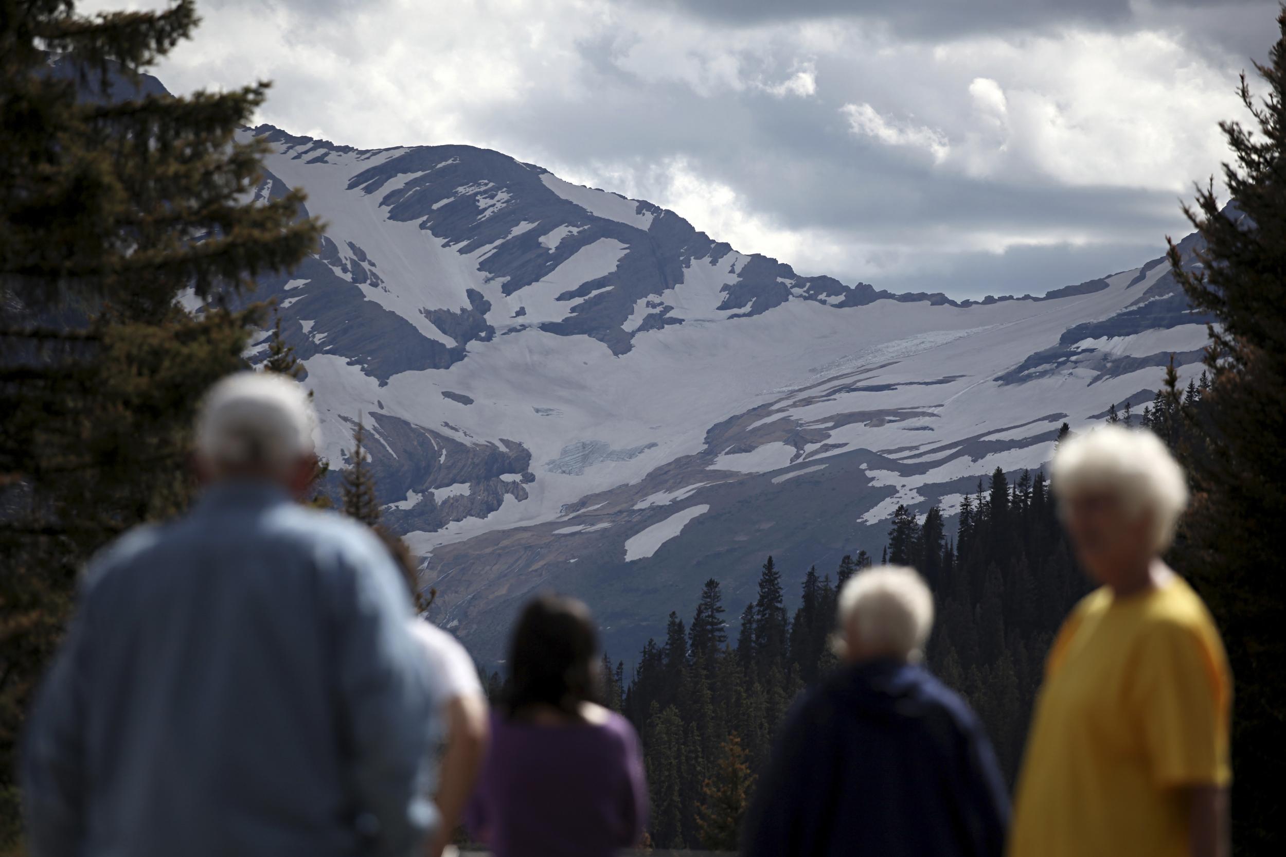 Park visitors gather at the Jackson Glacier Overlook on the east side of Going-to-the-Sun Road in Glacier National Park