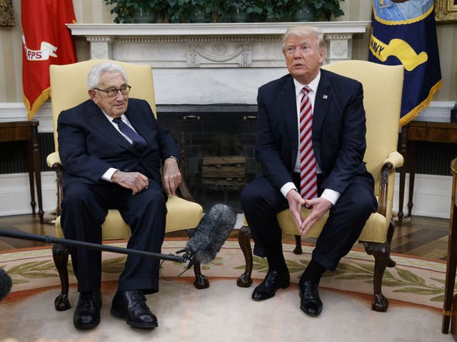 Donald Trump meeting with Henry Kissinger in the Oval Office