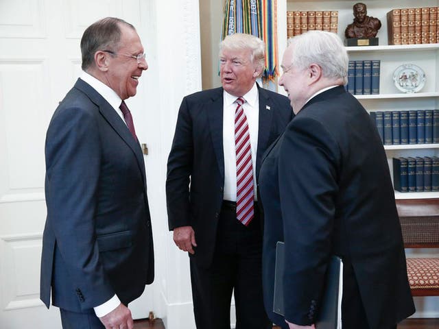A Russian foreign ministry photo showing Donald Trump with Sergey Lavrov  and Russian Ambassador Sergey Kislyak during their meeting in the White House on 10 May