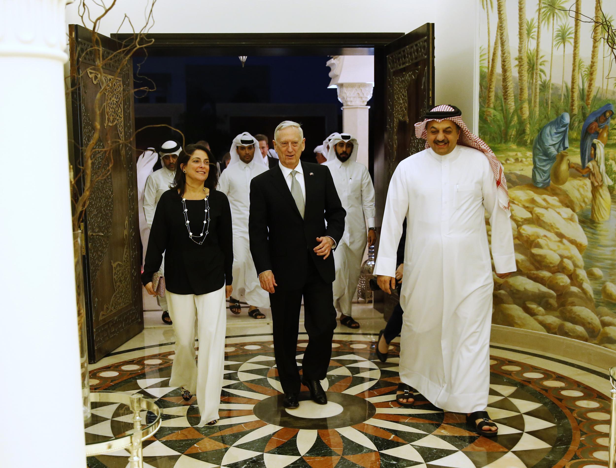Qatar's Minister of Defence Khalid bin Mohammad Al-Attiyah (R) welcomes US Defence Secretary James Mattis (C) and US Ambassador to Qatar Dana Shell Smith (L) at his residence on April 22, 2017 in Doha, Qatar