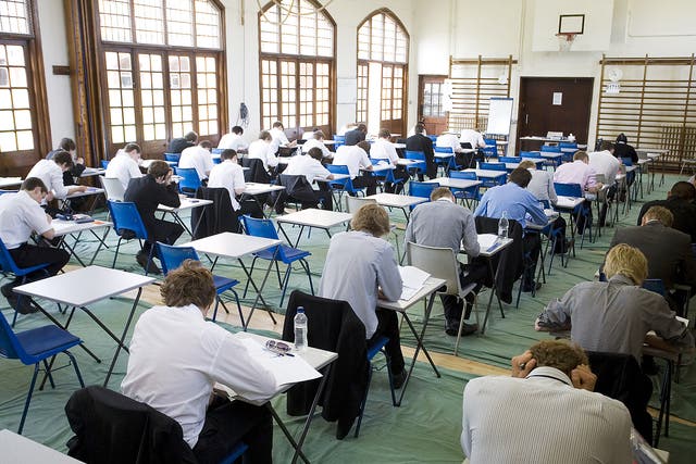 Students sitting exams in secondary school