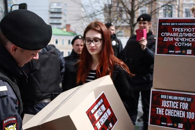 Activists carried empty boxes through central Moscow