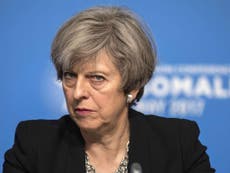 Theresa May dismisses David Cameron's 'extreme Brexit' warning