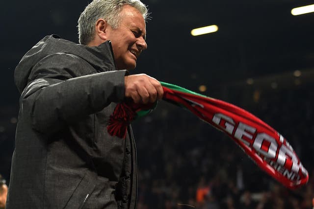 Mourinho swang a scarf around in jubilation at the end of the game