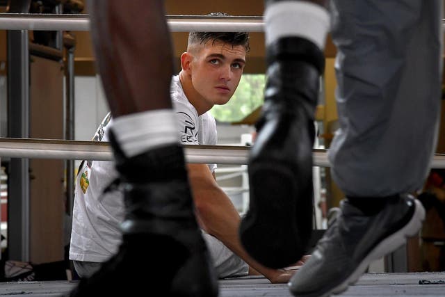 Irish boxer Lee Reeves watches local professional boxers spar at the Bald Eagle Recreation Center in Southwest Washington
