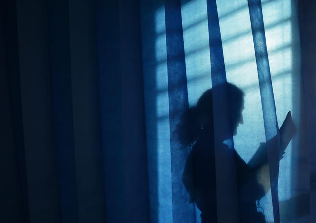 A nurses poses at St Thomas' Hospital in central London January 28, 2015