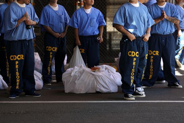 Prisoners stand in San Quentin Prison in San Francisco, California