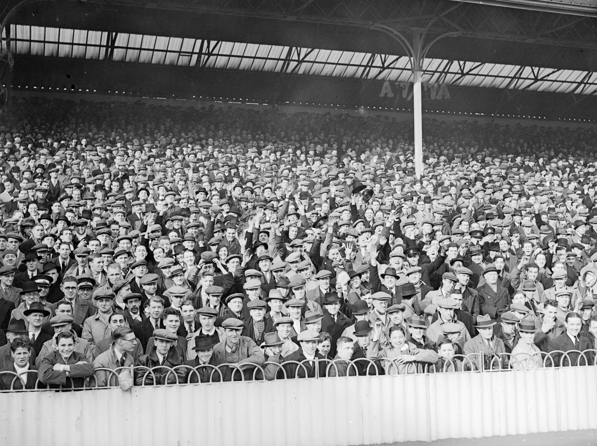 Spurs fans watching a cup replay at the Lane, in 1937