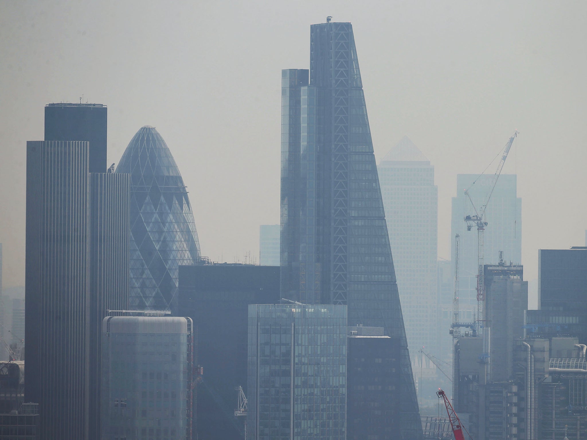 A view of the City of London with Canary Wharf in the background