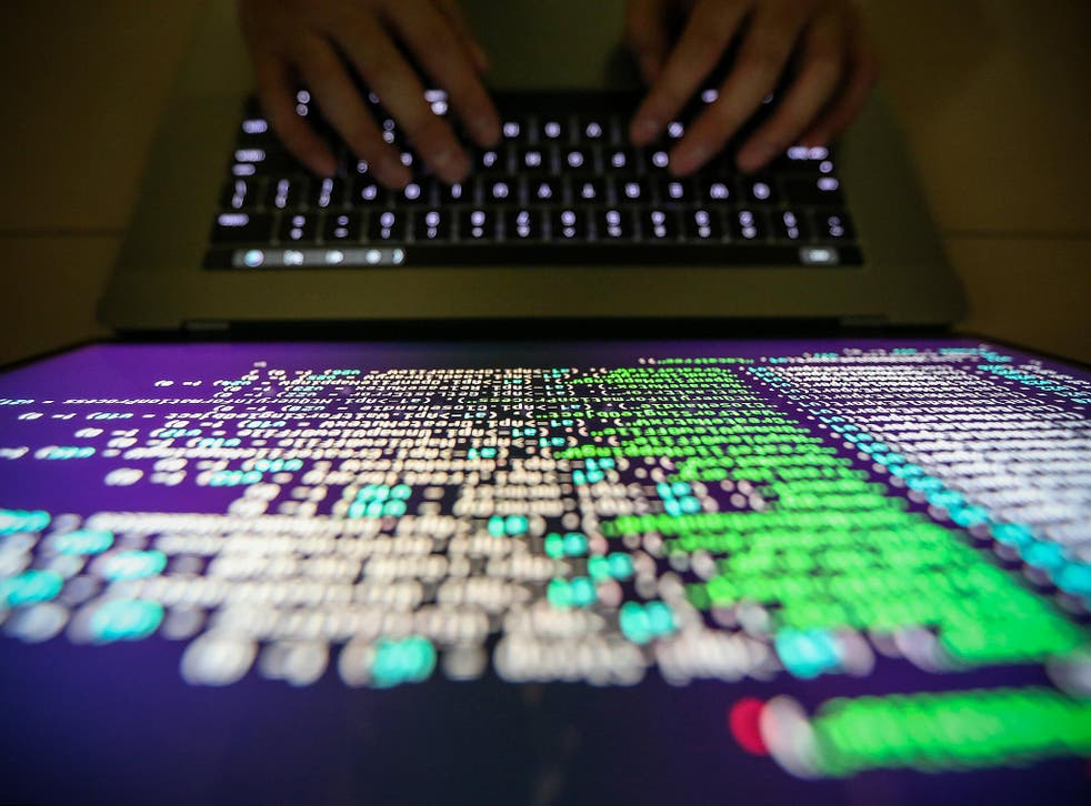 A programmer works on decrypting source code in Taipei, Taiwan. The attack hit systems in countries all over the world and there are fears hackers could strike again