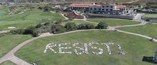 Protesters descend on Trump golf course to spell out word 'Resist!'