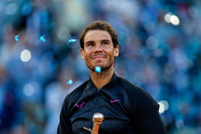Rafa Nadal with his trophy after victory on Sunday afternoon
