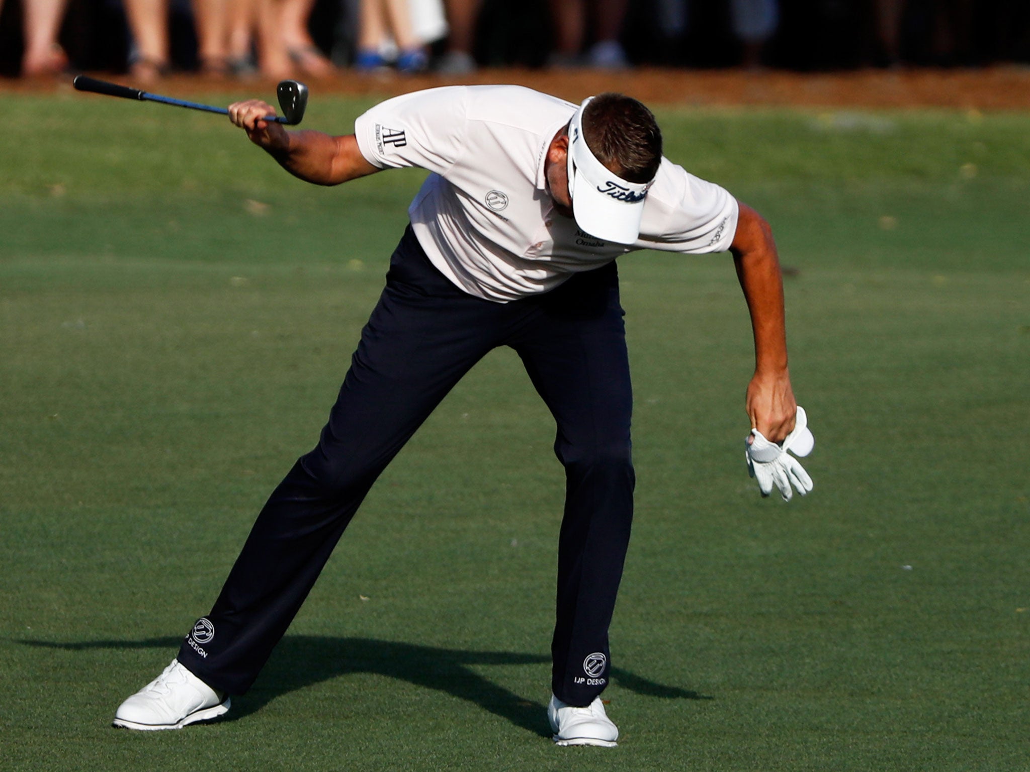 Poulter reacts on the 18th hole at Sawgrass