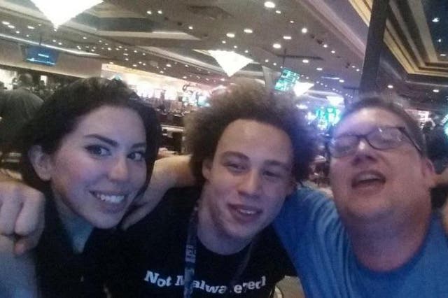 Marcus Hutchins (centre) with friends at a cyber security conference