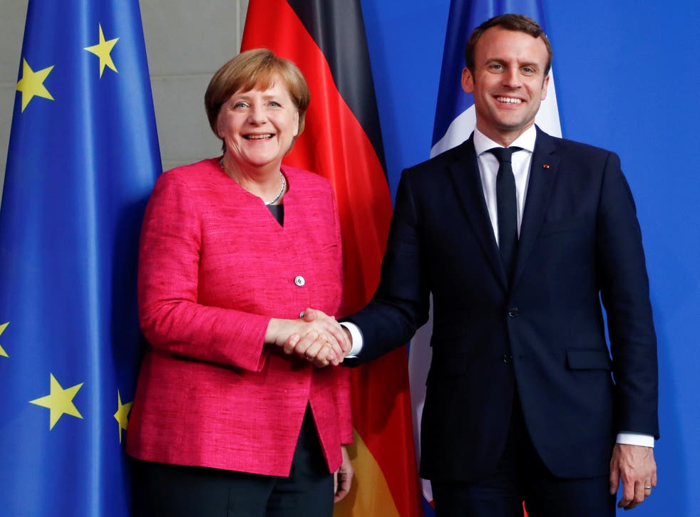 French President Emmanuel Macron met with German Chancellor Angela Merkel on his first day in office