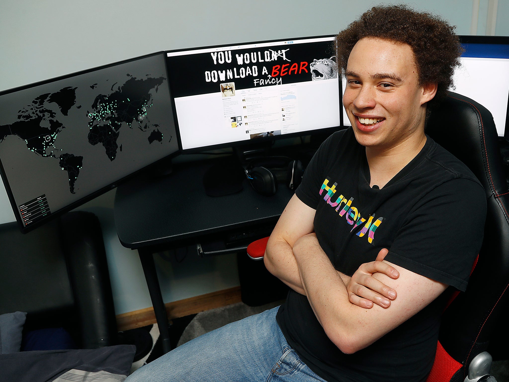 British IT expert Marcus Hutchins who has been branded a hero for slowing down the WannaCry global cyber attack, sits at his workstation during an interview in Ilfracombe, England