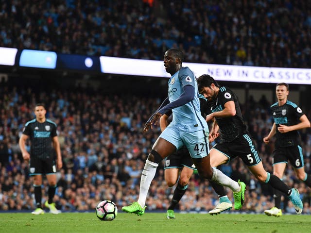 Yaya Toure signed a new one-year contract with City on Thursday
