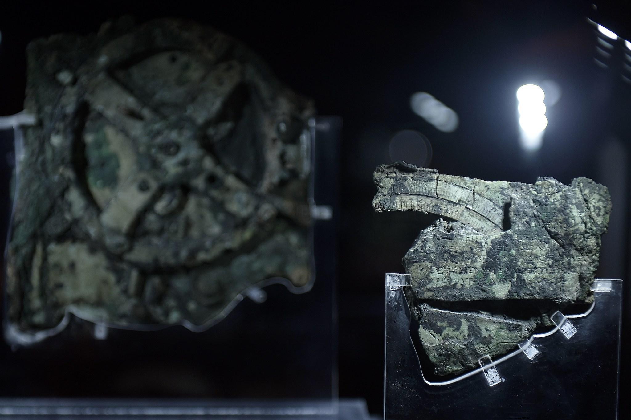 A picture taken at the Archaeological Museum in Athens on September 14, 2014 shows pieces of the so-called Antikythera Mechanism, a 2nd-century BC device known as the world's oldest computer, which was discovered by sponge divers in 1900 off a remote Greek island in the Aegean