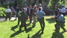 Erdogan's guards filmed beating up Kurdish protesters during DC visit