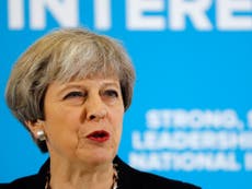 May 'isolated in own Cabinet' over plan to slash migration numbers