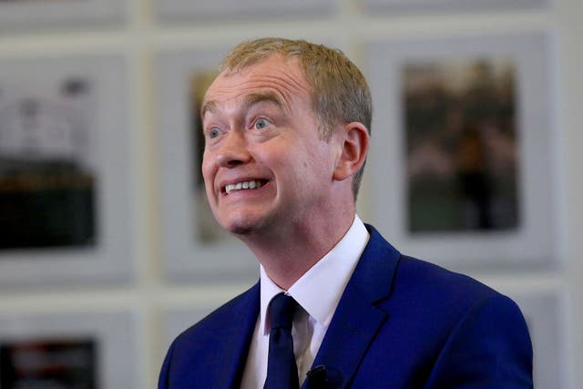 Tim Farron has apologised after failing to turn up to a vote on the Brexit trade bill