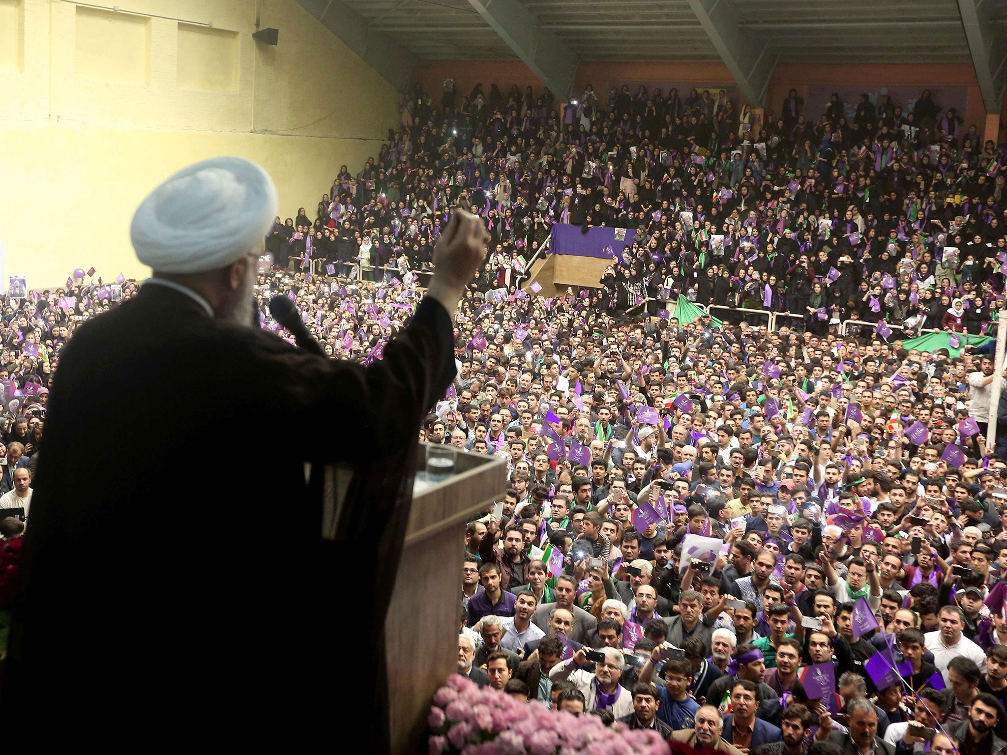 Iranian President and candidate in the upcoming presidential elections Hassan Rouhani (pictured) faces a tough battle against hardline jurist Ebrahim Raisi in Friday's vote