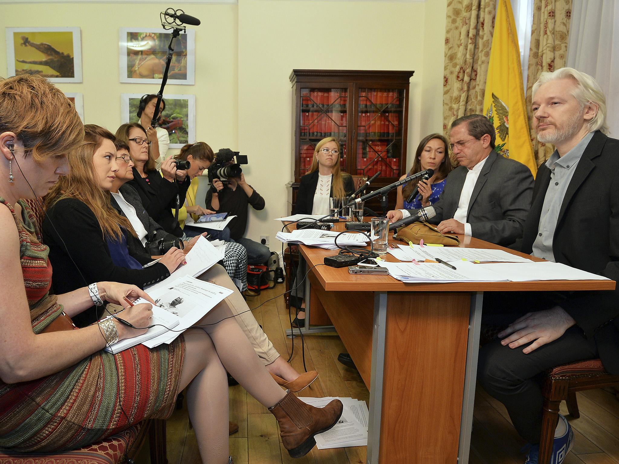 The WikiLeaks founder holds a press conference inside the embassy in 2014