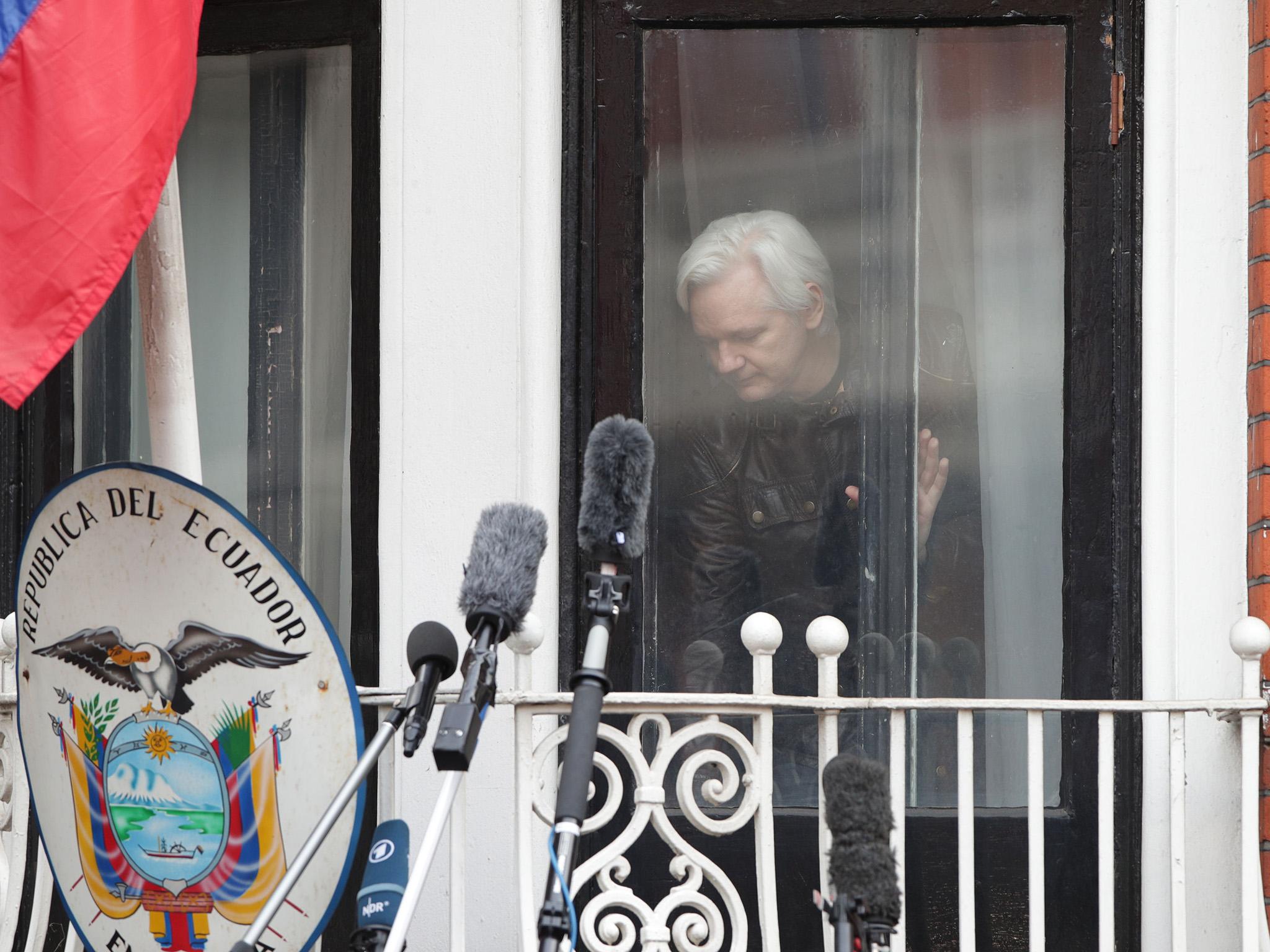 Julian Assange speaks from the balcony of the Ecuadorian embassy