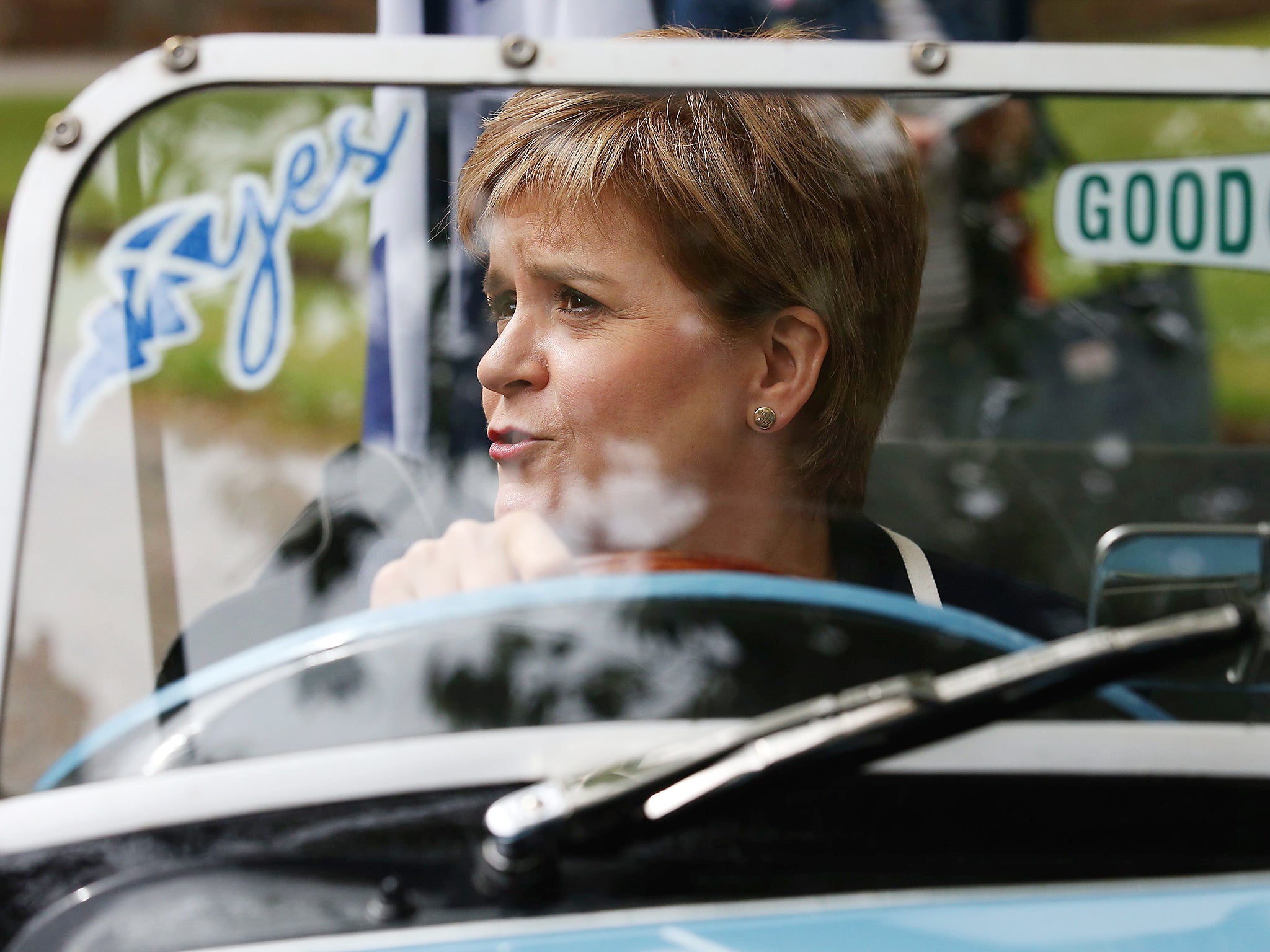 First Minister and SNP leader Nicola Sturgeon sits in the driving seat of a Midge car during a visit to Moffat on the General Election campaign trail