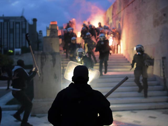 Demonstrators hurled petrol bombs and firecrackers in protest of the new belt-tightening measures