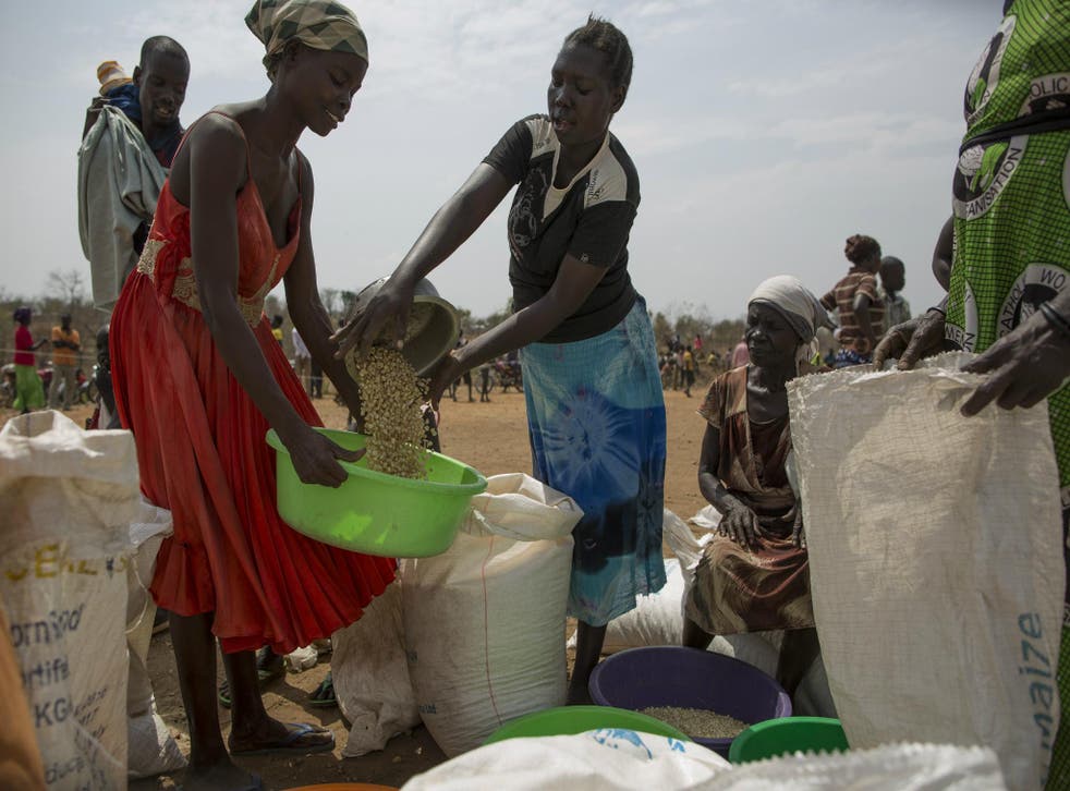 Food is distributed by the World Food Programme at the Bidibidi refugee camp in Uganda 