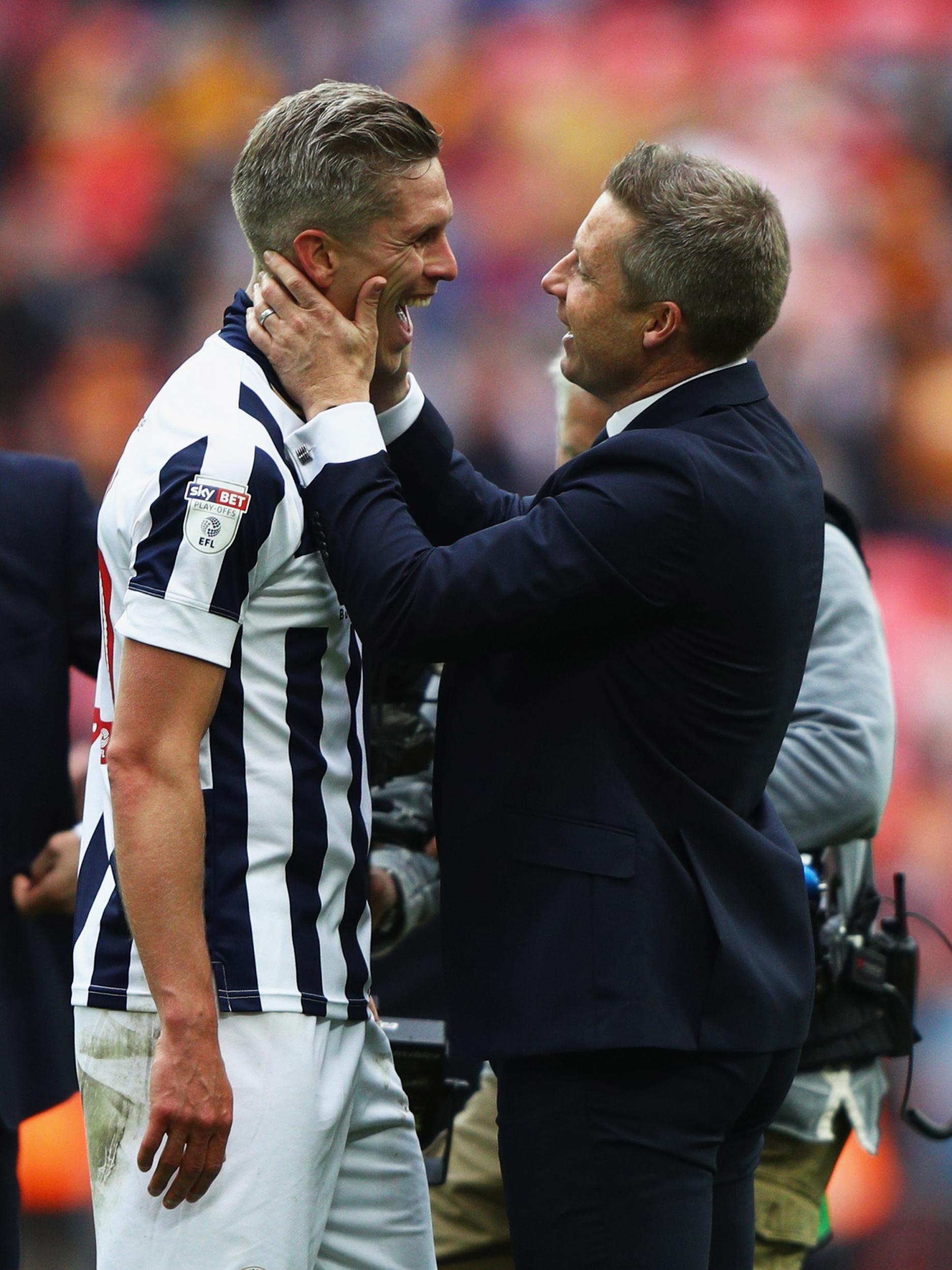 Morison celebrates victory with his manager