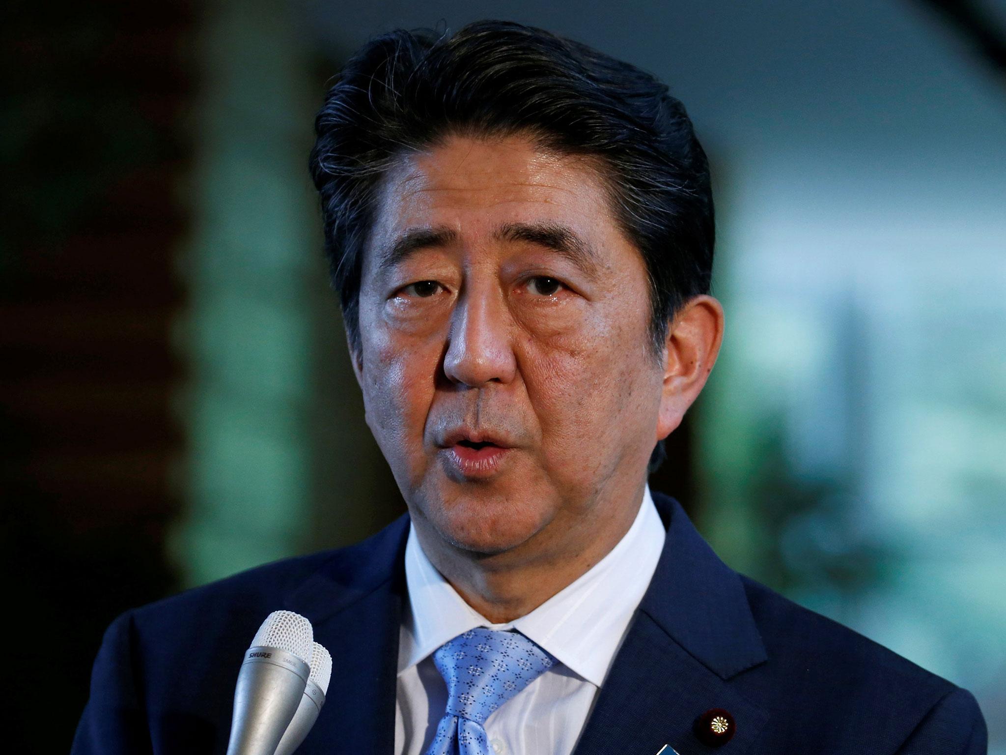 Japan's Prime Minister Shinzo Abe speaks on reports of the launch of a North Korean missile earlier this month