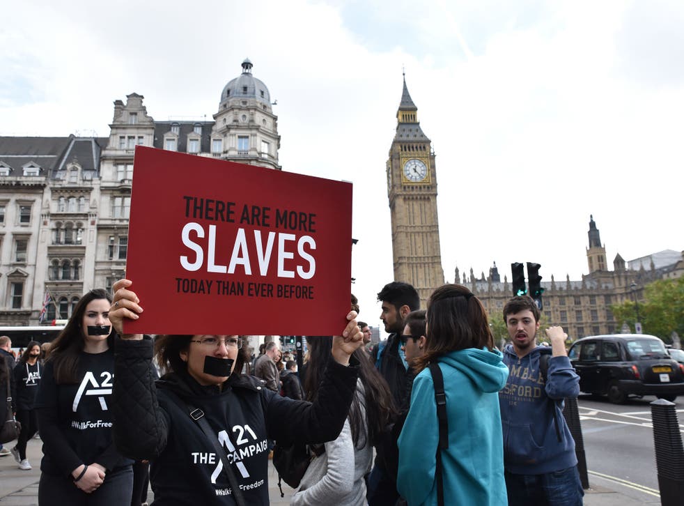Protesters against human trafficking and modern slavery outside the Houses of Parliament late last year
