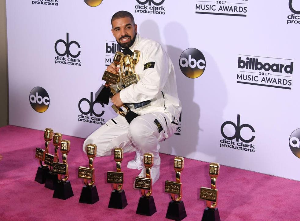 Drake poses with his 13 Billboard Music Awards