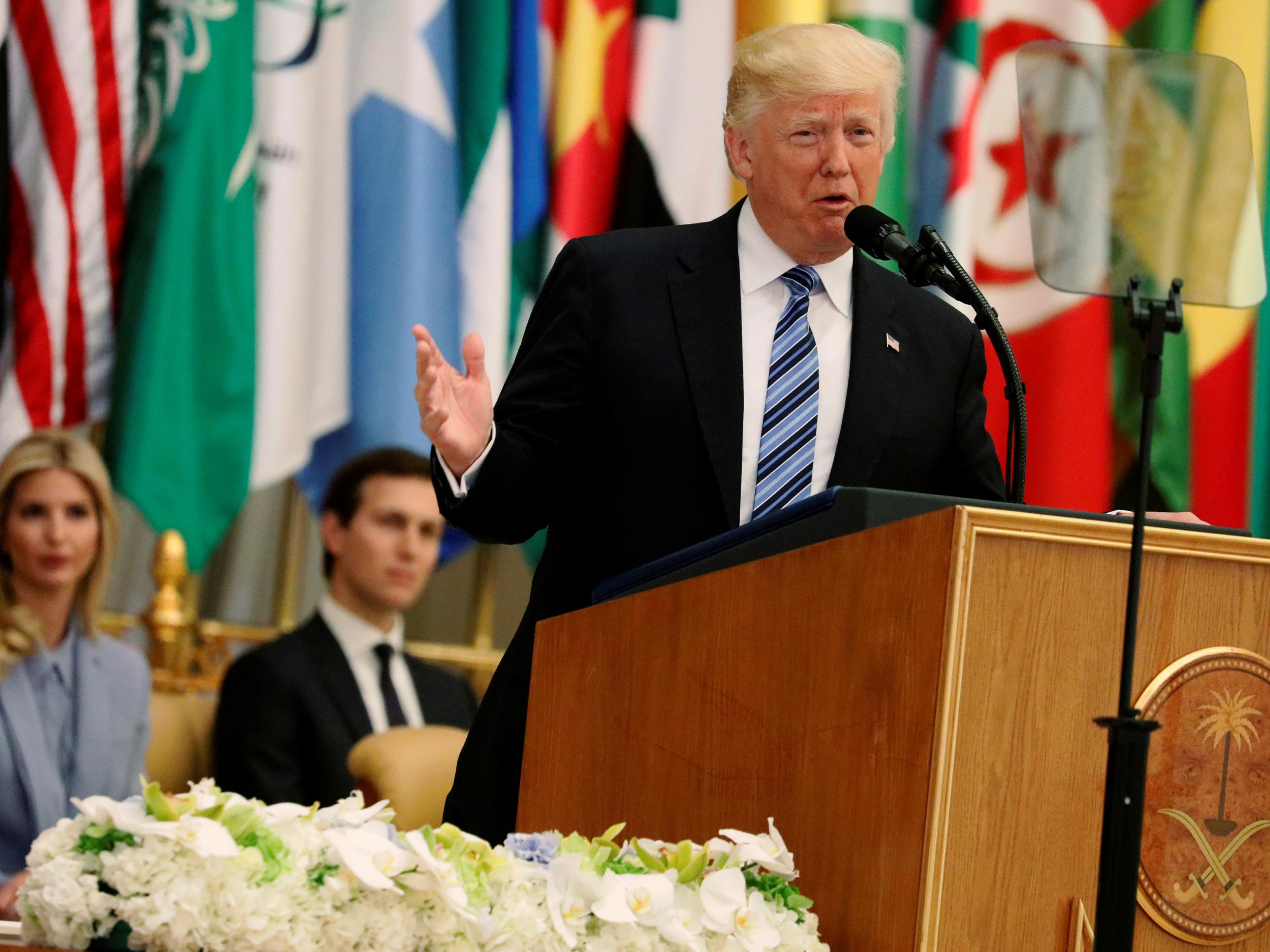 US President Donald Trump, flanked by Ivanka Trump and White House senior adviser Jared Kushner, delivers remarks to the Arab Islamic American Summit in Riyadh, Saudi Arabia, on 21 May 2017