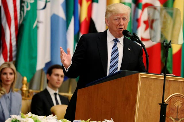 US President Donald Trump, flanked by Ivanka Trump and White House senior adviser Jared Kushner, delivers remarks to the Arab Islamic American Summit in Riyadh, Saudi Arabia, on 21 May 2017