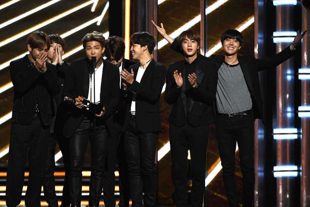 K-pop group BTS accepts the prize for Top Social Artist at the Billboard Music Awards