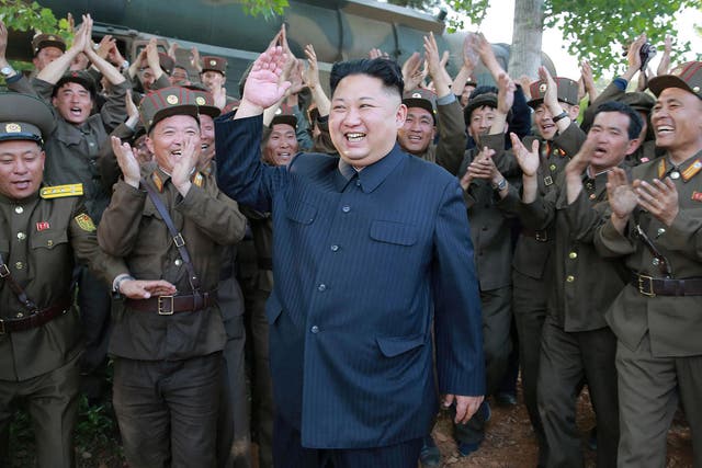 North Korean dictator Kim Jong-un inspects the medium-range ballistic missile Pukguksong-2's launch test