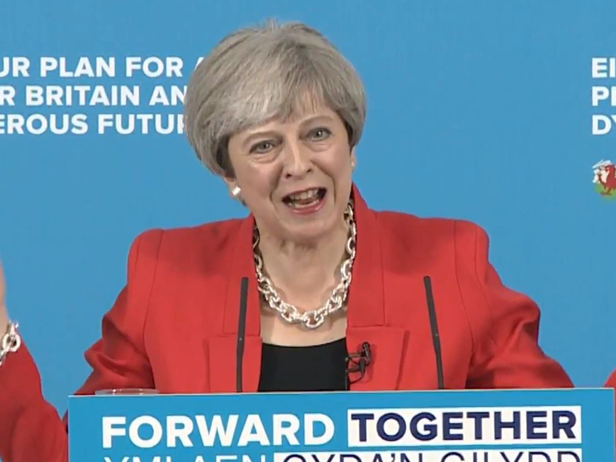 Theresa May left flustered and stuttering after dementia tax U-turn announcement
